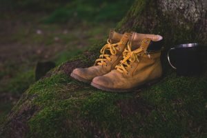 Hiking boots by Tree