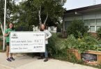 Karen Hutchinson receiving cheque from Allison
